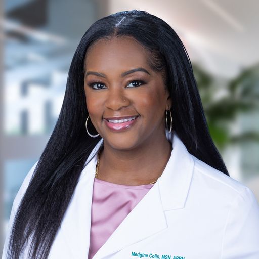 A headshot image of Medgine Colin