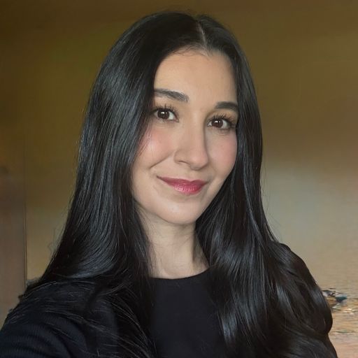 A headshot image of Jasmine Issa