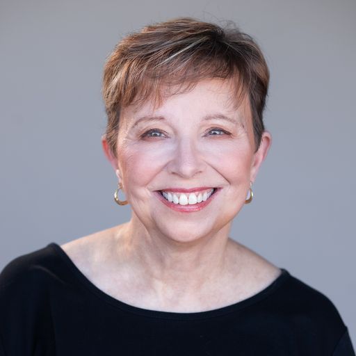 A headshot image of Lynn Burke Reyes