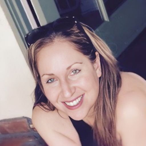 A headshot image of Michelle Charness-Adams