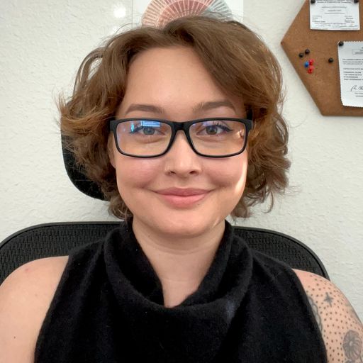 A headshot image of Cassandra Julian