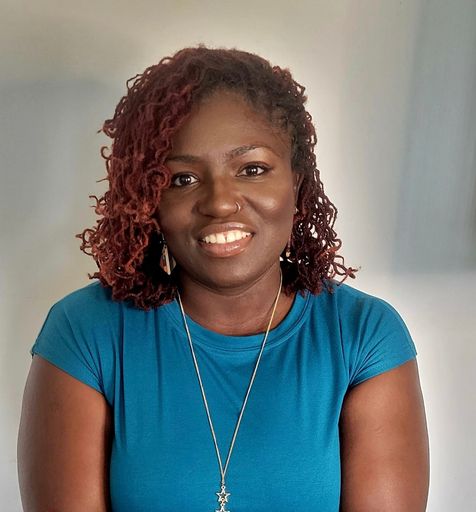 A headshot image of Tomilola Monroe