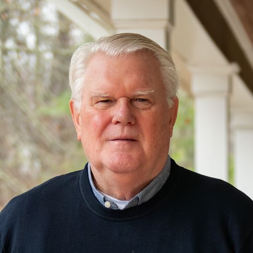 A headshot image of John Heil