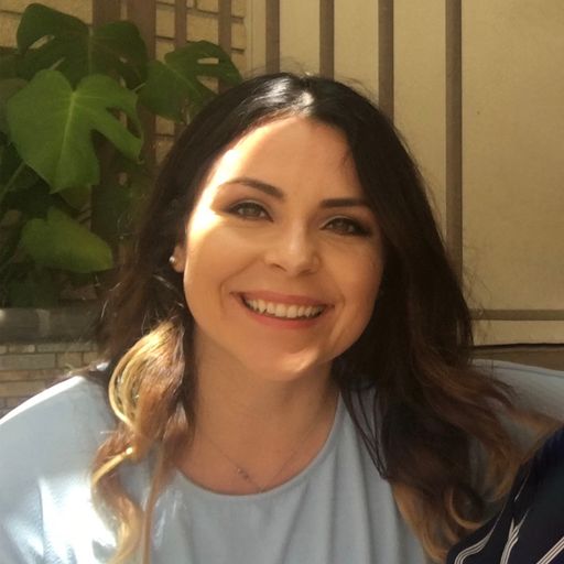 A headshot image of Elizabeth Munoz