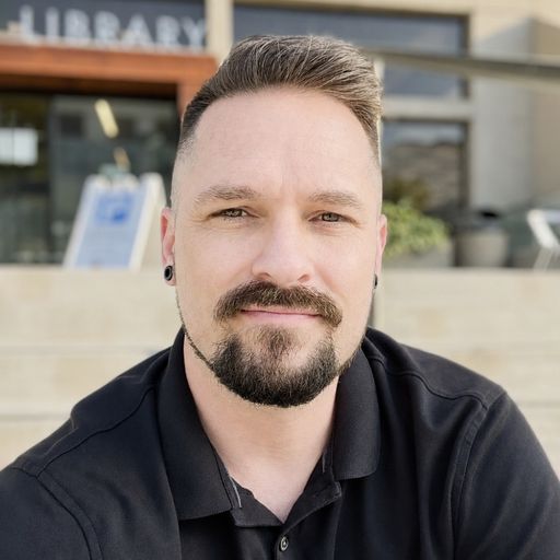 A headshot image of Bryan Hamilton