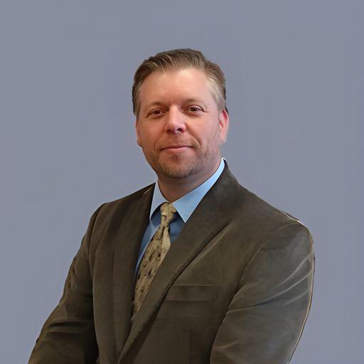 A headshot image of Thomas Olsen