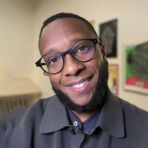 A headshot image of Amani Stafford King