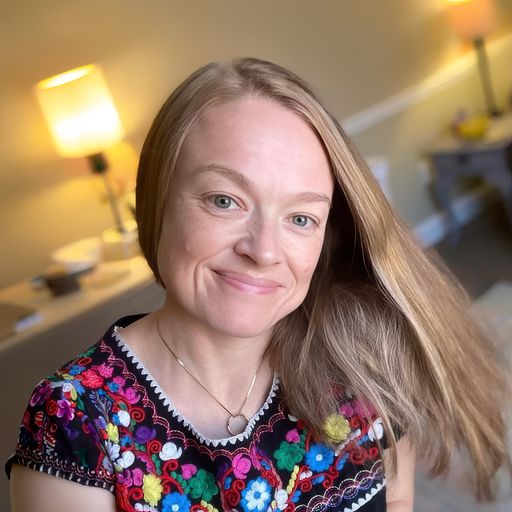 A headshot image of Anna Wood