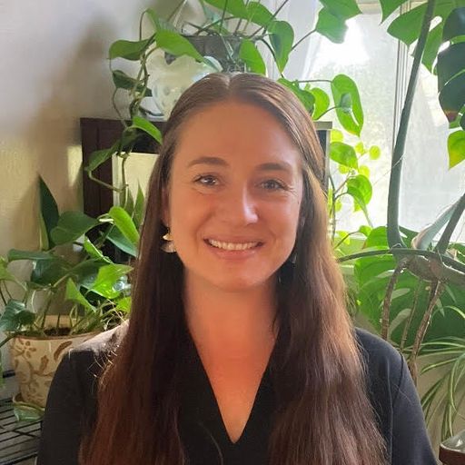 A headshot image of Kendra Cover