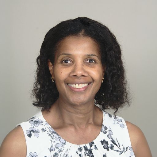 A headshot image of Ivy Dey-Johnson