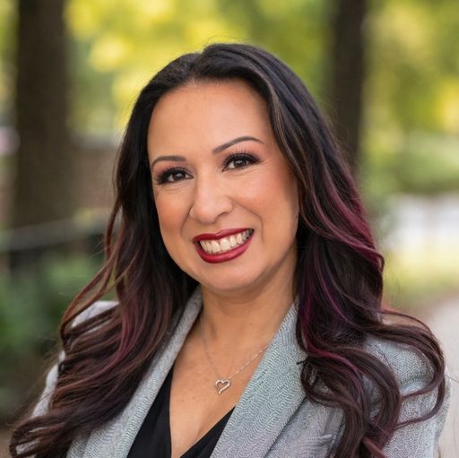 A headshot image of Raelara Tilden