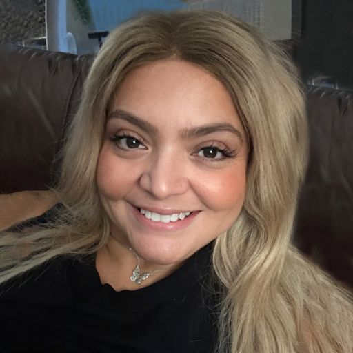 A headshot image of Tina Santiago