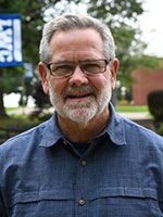 A headshot image of Daniel Melear