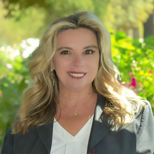 A headshot image of Tammy Ricker
