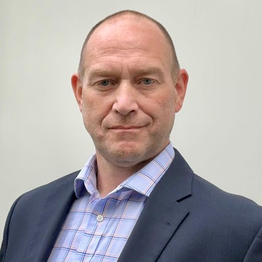 A headshot image of Shane Robinson