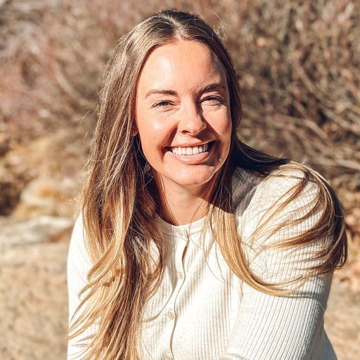 A headshot image of Justine Brandenburg