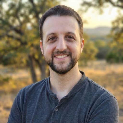 A headshot image of Stephen Reynolds