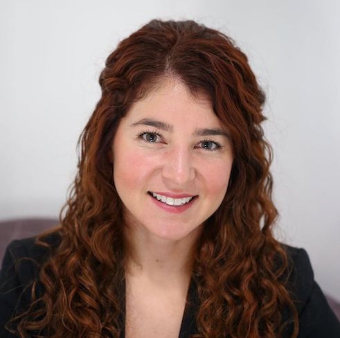 A headshot image of Kaitlin Strauss