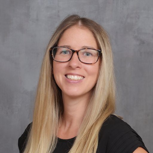 A headshot image of Tiffany Machia