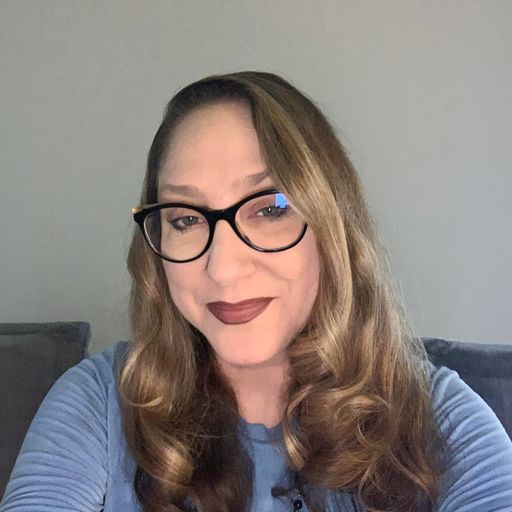 A headshot image of Laura Mason