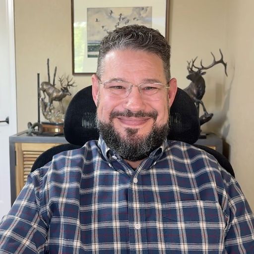 A headshot image of Miles Kramer