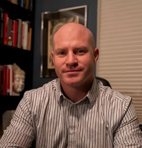 A headshot image of Jared Yslas