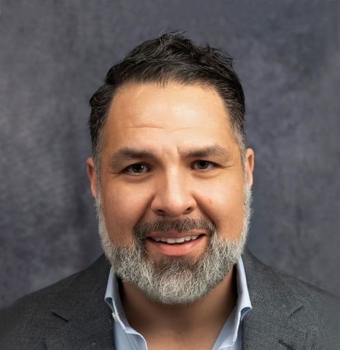 A headshot image of Luis Rodriguez