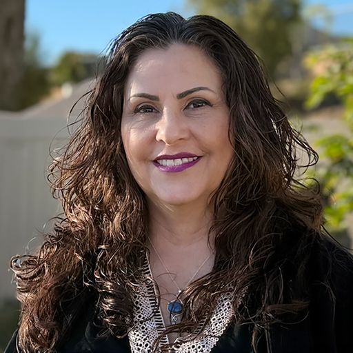 A headshot image of Shannon Rodriguez