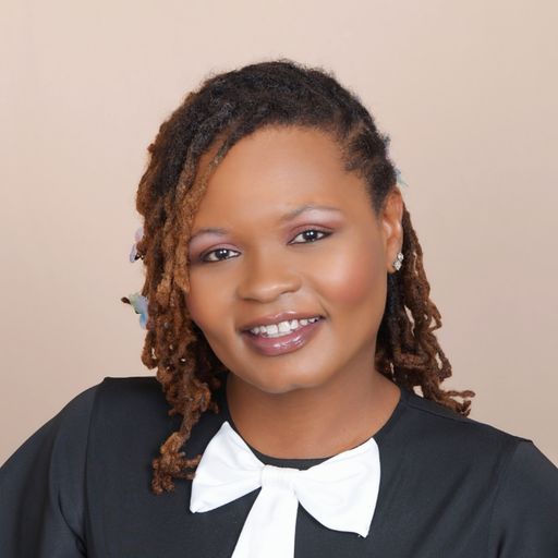 A headshot image of Tasha Hill