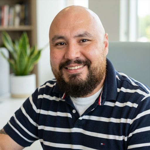A headshot image of Eddie Herrera