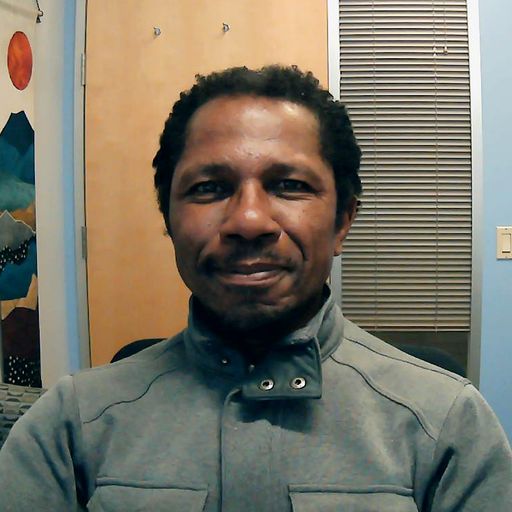 A headshot image of Lawrence Woods