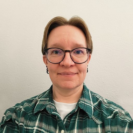 A headshot image of Kimberly Hughes