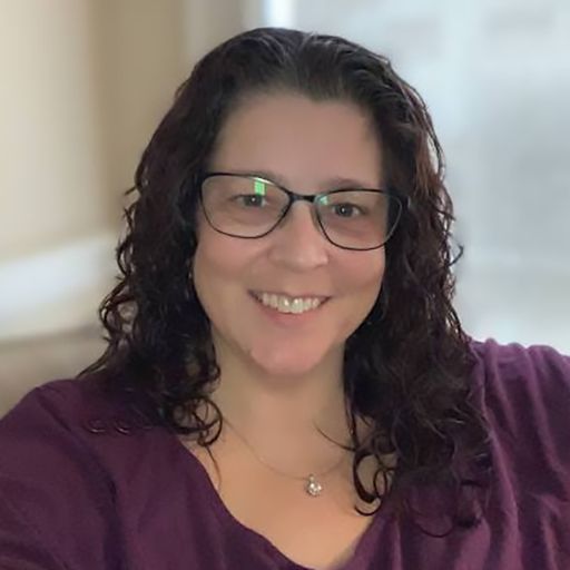A headshot image of Kristie Ashe