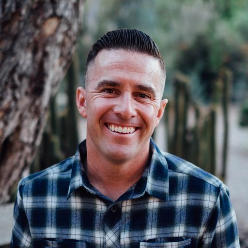 A headshot image of Warren Basile