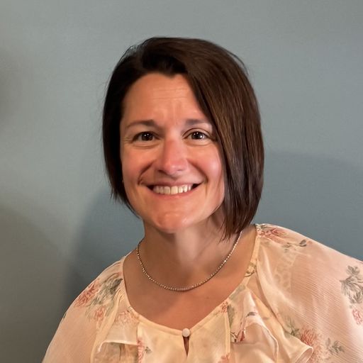 A headshot image of Christy Reyes