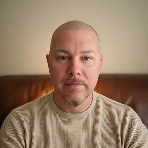A headshot image of George Burnetz