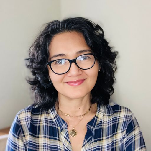 A headshot image of Luisa Amighetti