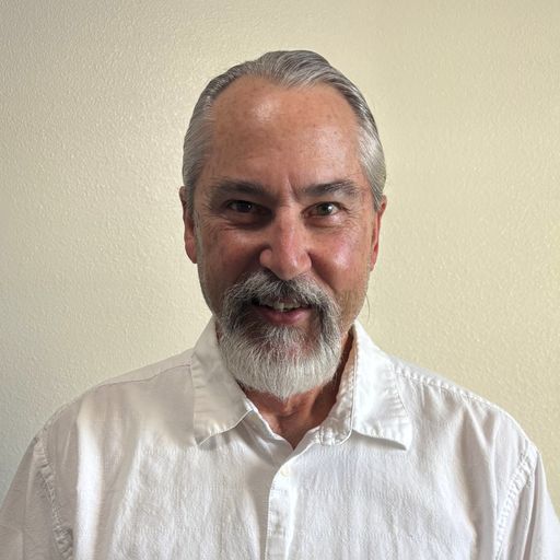 A headshot image of James Degroot