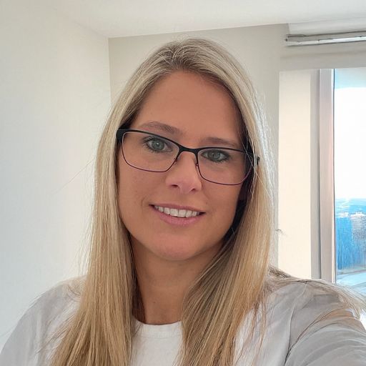 A headshot image of Sasha Edwards