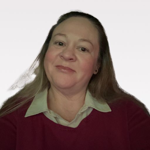 A headshot image of Anne Dewberry-Beswick