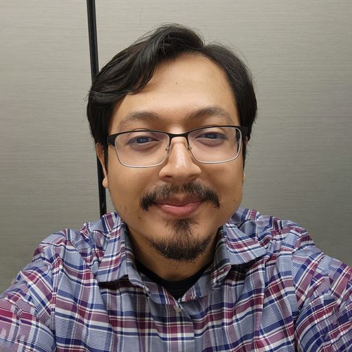A headshot image of Ricardo Torres
