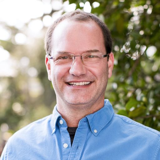 A headshot image of Jonathan Reynolds