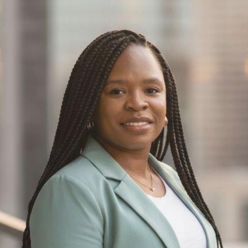 A headshot image of Tameka Scott