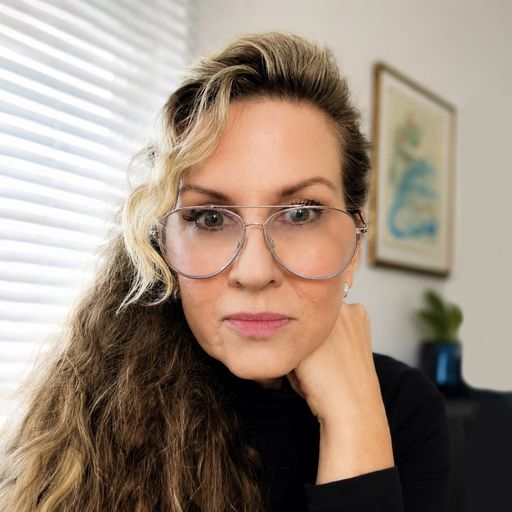 A headshot image of Erica Cable