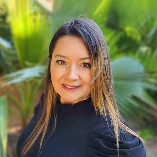 A headshot image of Mayra Hernandez
