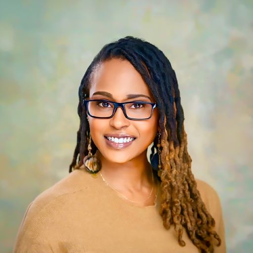 A headshot image of Dominique Walker