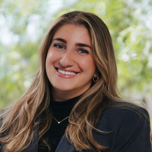 A headshot image of Nicole Massoud