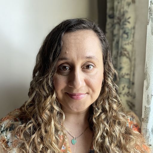 A headshot image of Elizabeth Swett