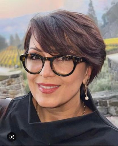 A headshot image of Riah Skrinnik