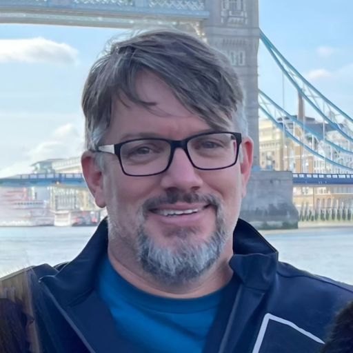 A headshot image of Michael Henderson